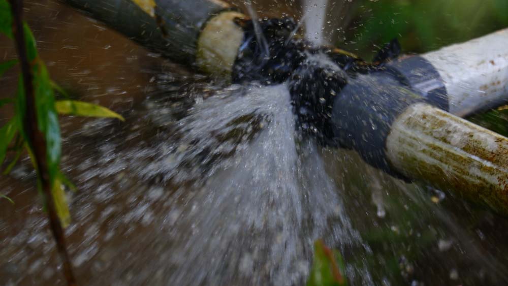 water dripping from a busted pipe line